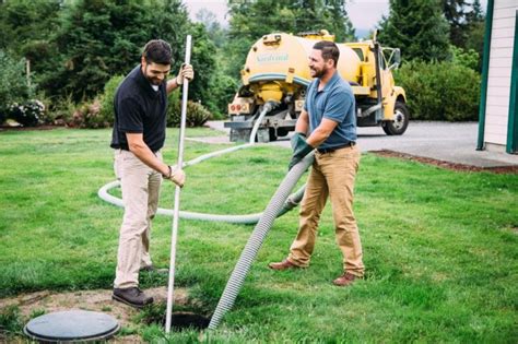 When Should You Consider Septic Tank Servicing Near Me Services?